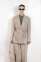 The Suit Jacket 576 by Acne Studios has a relaxed fit with constructed shoulders