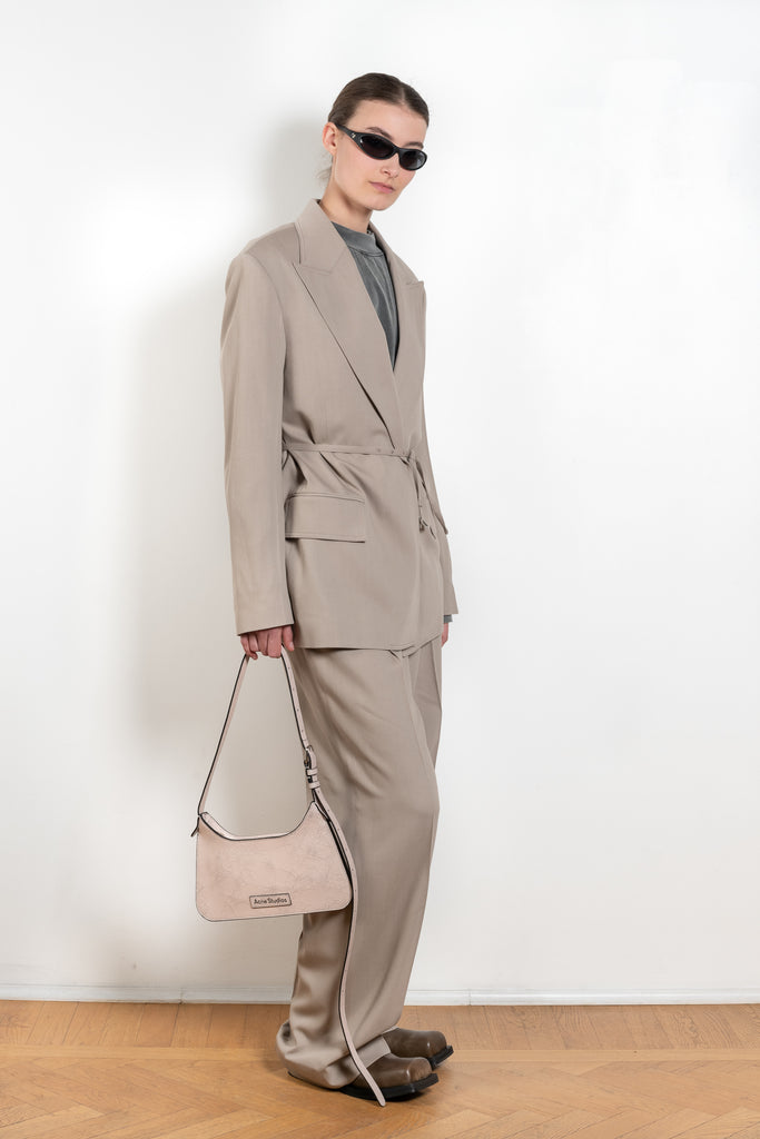 The Suit Jacket 576 by Acne Studios has a relaxed fit with constructed shoulders