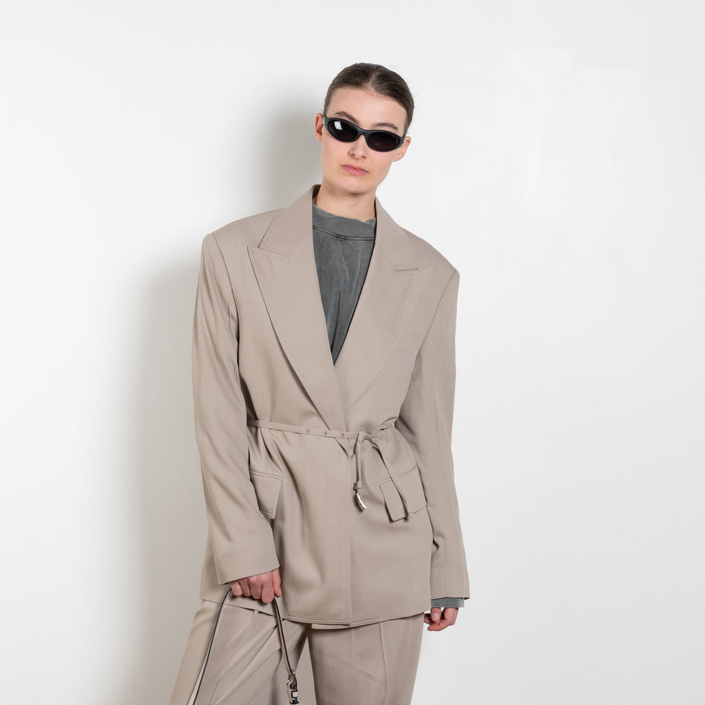 The Suit Jacket 576 by Acne Studios has a relaxed fit with constructed shoulders