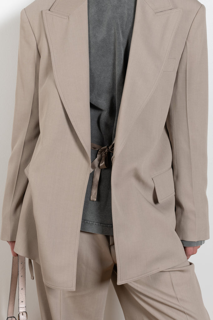 The Suit Jacket 576 by Acne Studios has a relaxed fit with constructed shoulders