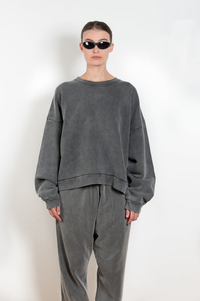 The Sweat 0017 by Acne Studios is a signature sweater with a small rubber logo patch on the back