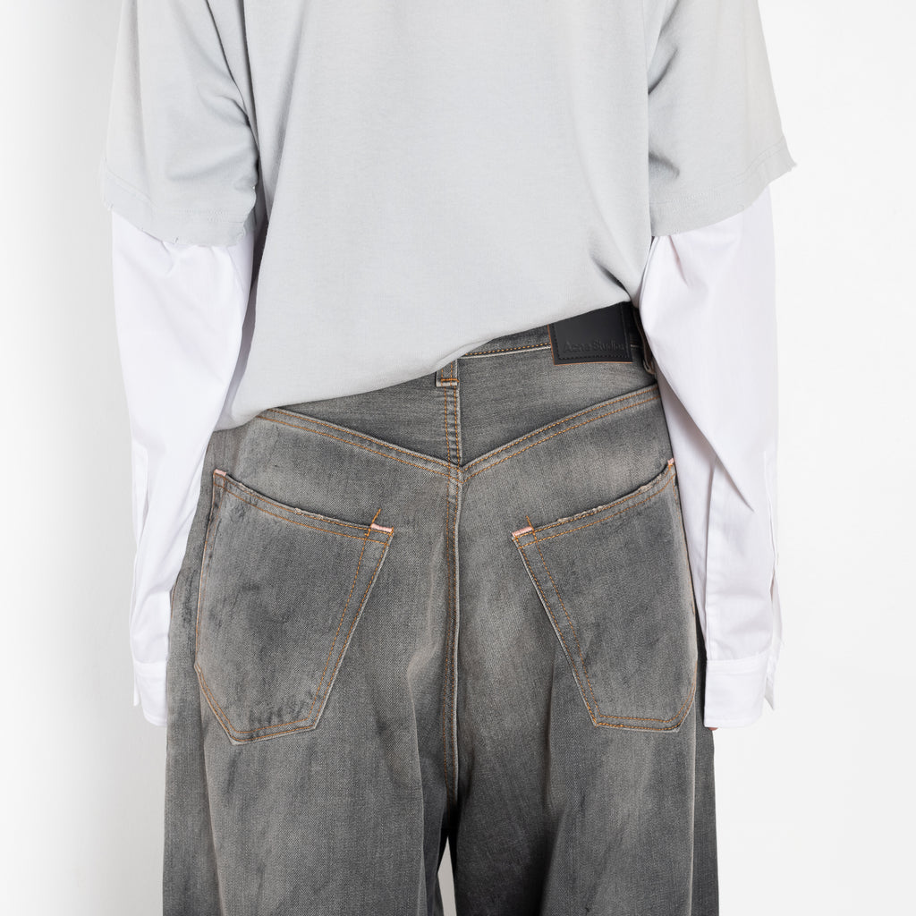 The Super Baggy Jeans 2023 jeans by Acne Studios are cut to a super baggy fit with a mid waist, super wide leg and long length