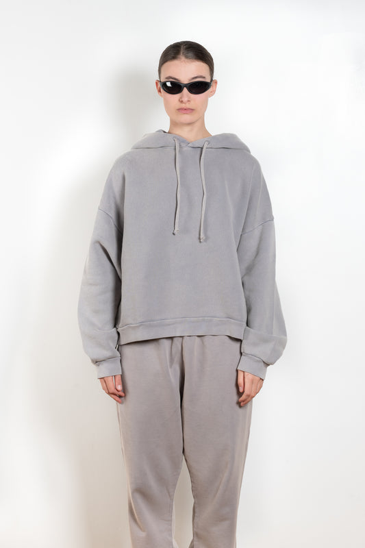 The Hooded Sweater 0019 by Acne Studios is a signature hoodie sweater with a small rubber logo patch on the back