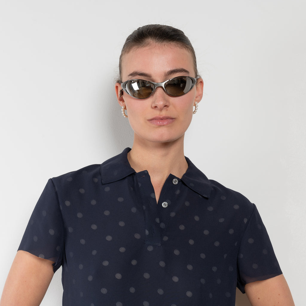 The Layered Tshirt by Acne Studios&nbsp; features seasonal polka dot artwork, adorned with shredded cuts and double-layered mesh construction