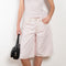 The Baggy V Short by Agolde is a relaxed short with a longer length and a signature high-pitched V-waist detail for a flattering, vintage-inspired touch