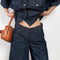 The Baggy V Short by Agolde is a relaxed short with a longer length and a signature high-pitched V-waist detail for a flattering, vintage-inspired touch