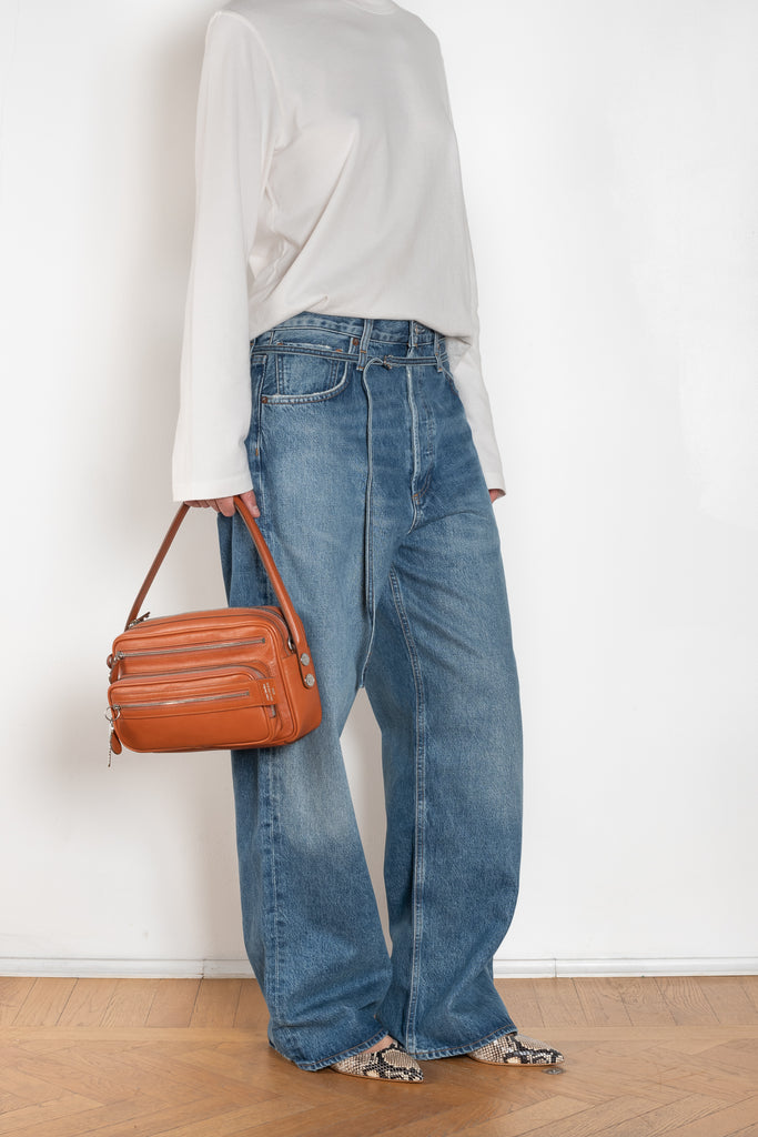 The Emmi Jean by Agolde has a long inseam, perfect for a slouchy look, and is cinched with a thin denim belt for added style