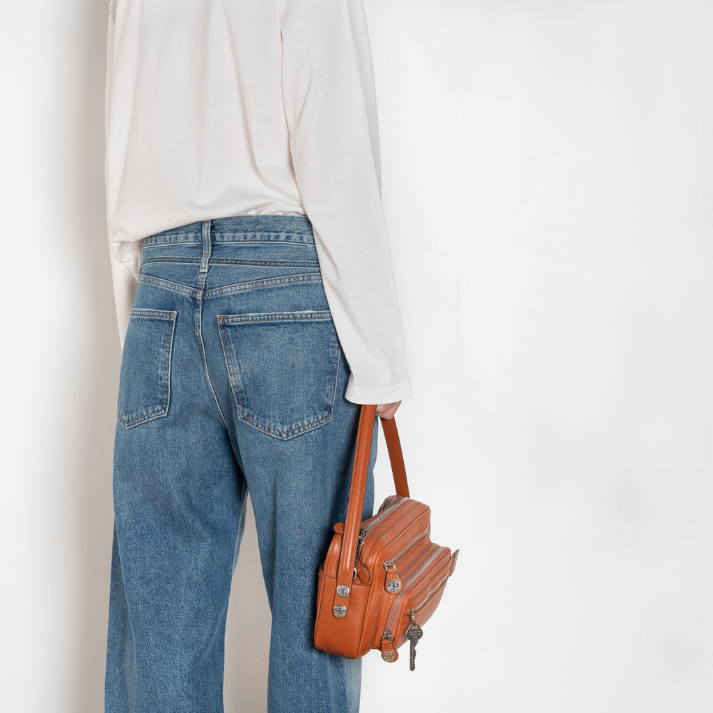 The Emmi Jean by Agolde has a long inseam, perfect for a slouchy look, and is cinched with a thin denim belt for added style