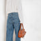 The Emmi Jean by Agolde has a long inseam, perfect for a slouchy look, and is cinched with a thin denim belt for added style