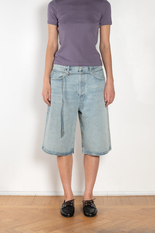 The Emmi Short by Agolde has a long inseam, perfect for a slouchy look, and is cinched with a thin denim belt for added style