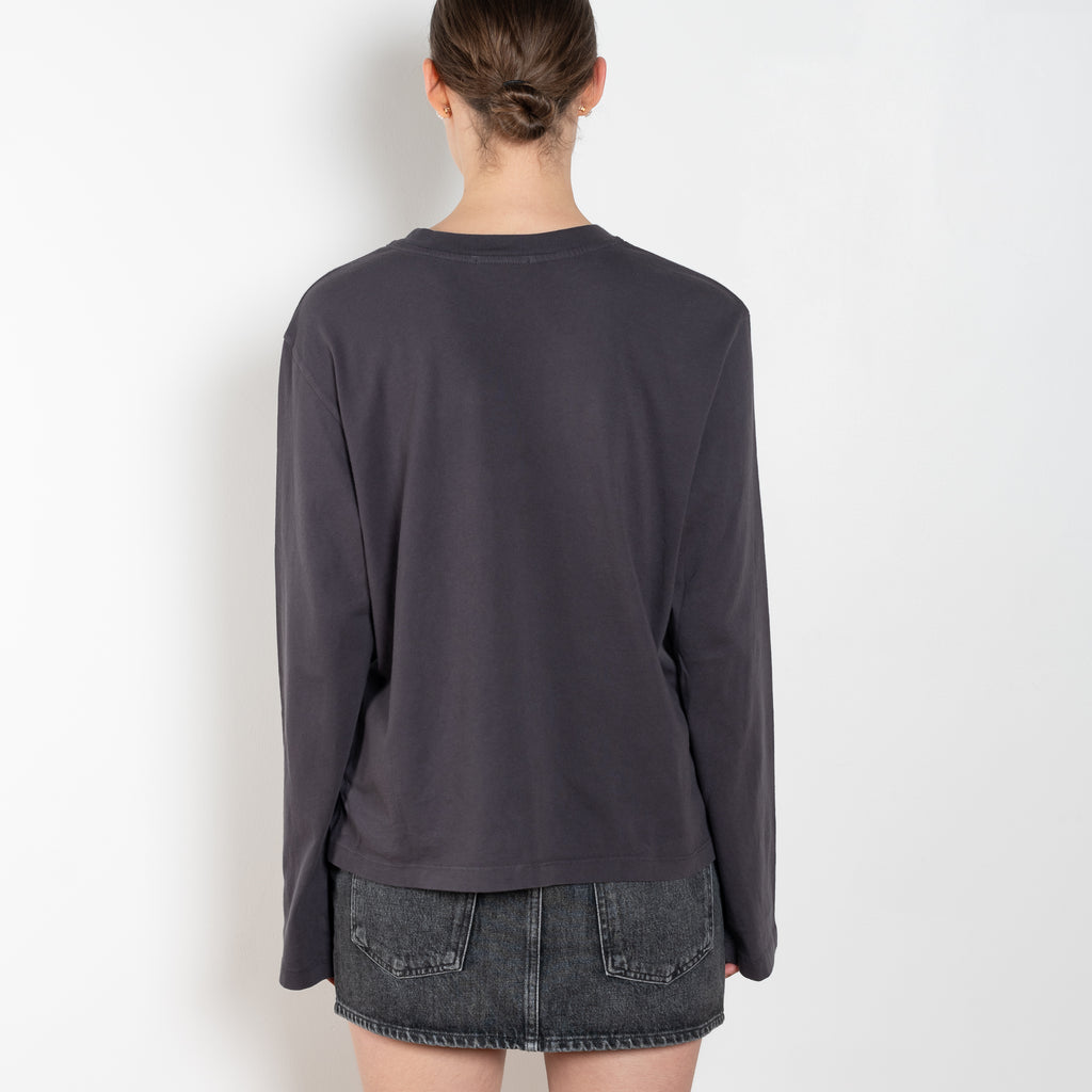 The Runa Tee by Agolde is a structured long sleeved cotton tee with dropped shoulders