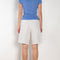 The Indra Short by Agolde is a relaxed short, a season essential, offering a hip-slung fit with a square top block for a relaxed and effortless style