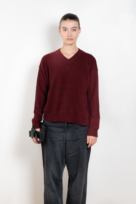 The Mathilde Crop Sweater by Alexandra Golovanoff is a signature V-neck sweater with a relaxed fit