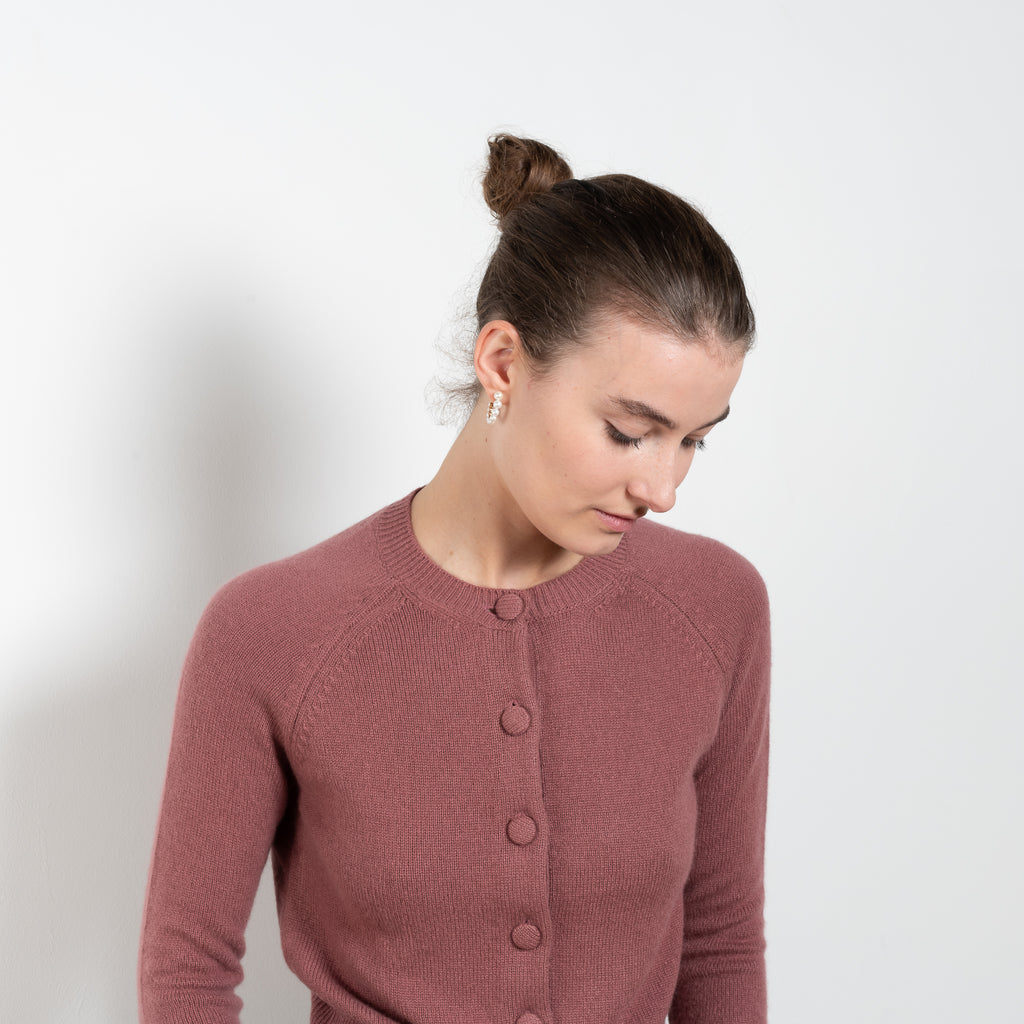 The Mila Cardigan by Alexandra Golovanoff is a signature cashmere cardigan with a boxy and effortless cut and cashmere covered button