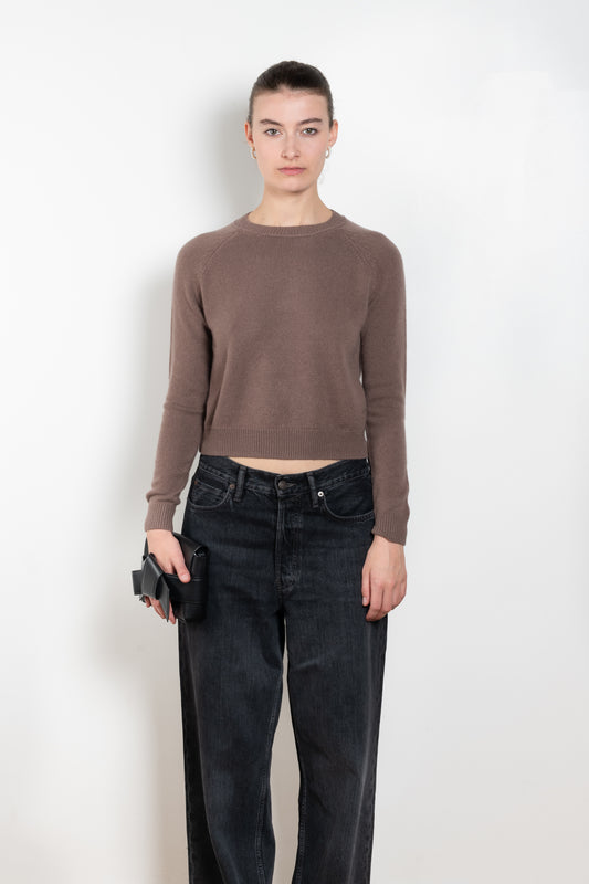 The Mini Mila sweater by Alexandra Golovanoff is a signature round neck sweater with a shorter cut for a fitted look