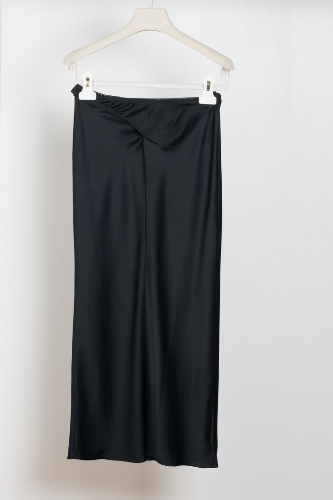 The Vesta Midi Skirt by Anna October is a signature summer skirt with a bias cut