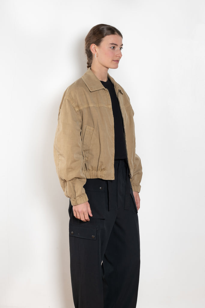 The Gabardine Blouson by Auralee is a short blouson jacket with a natural dye and soft feel
