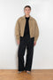 The Gabardine Blouson by Auralee is a short blouson jacket with a natural dye and soft feel