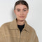 The Gabardine Blouson by Auralee is a short blouson jacket with a natural dye and soft feel