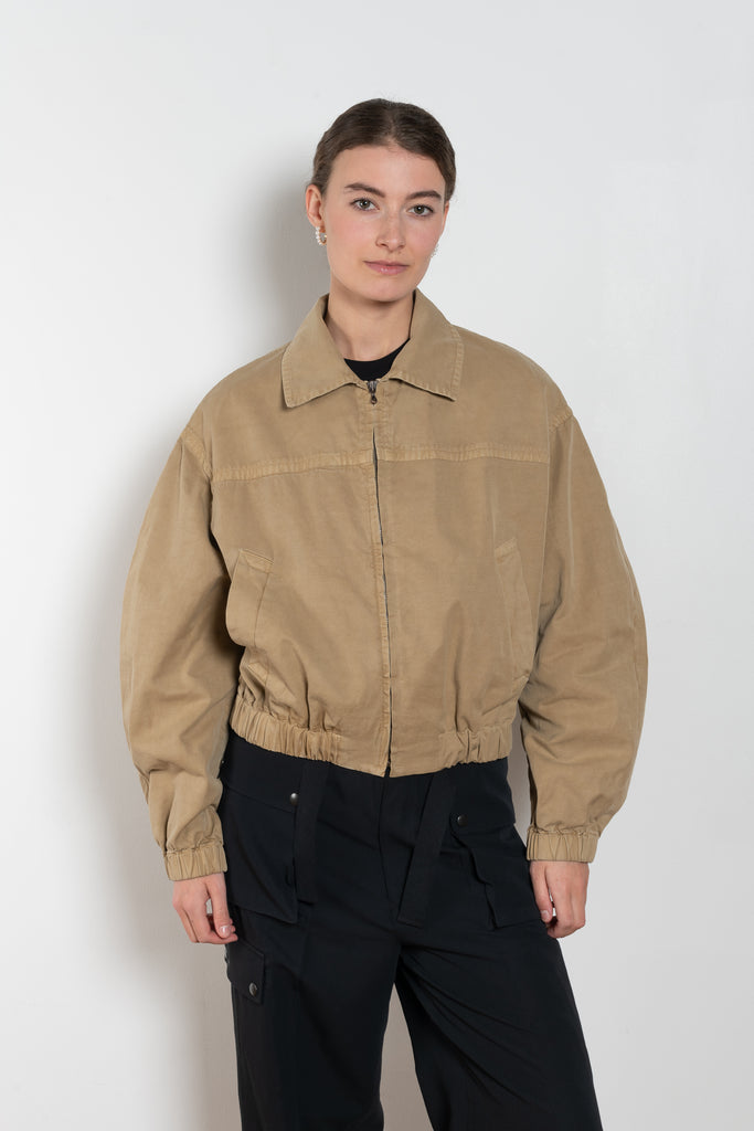 The Gabardine Blouson by Auralee is a short blouson jacket with a natural dye and soft feel