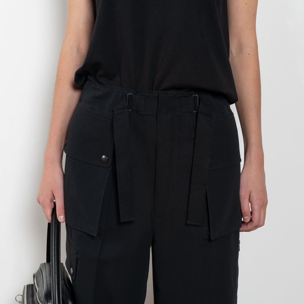 The Lightweight Cargo Pants by Auralee is a relaxed trouser in a lightweight cotton and wool blend with cargo details