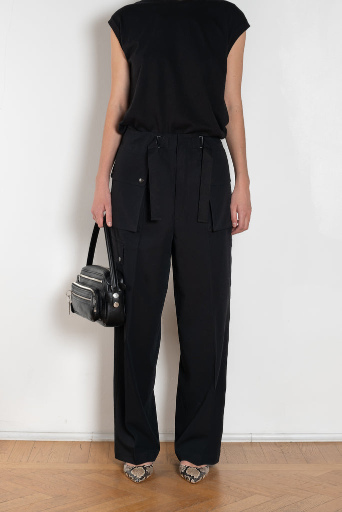 The Lightweight Cargo Pants by Auralee is a relaxed trouser in a lightweight cotton and wool blend with cargo details