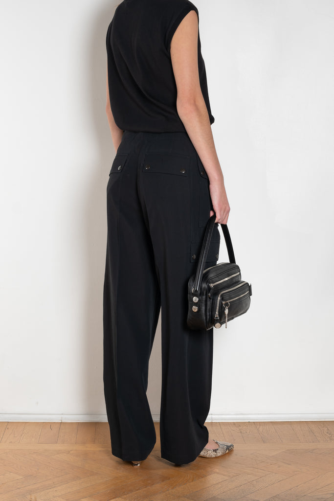 The Lightweight Cargo Pants by Auralee is a relaxed trouser in a lightweight cotton and wool blend with cargo details