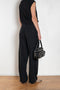 The Lightweight Cargo Pants by Auralee is a relaxed trouser in a lightweight cotton and wool blend with cargo details