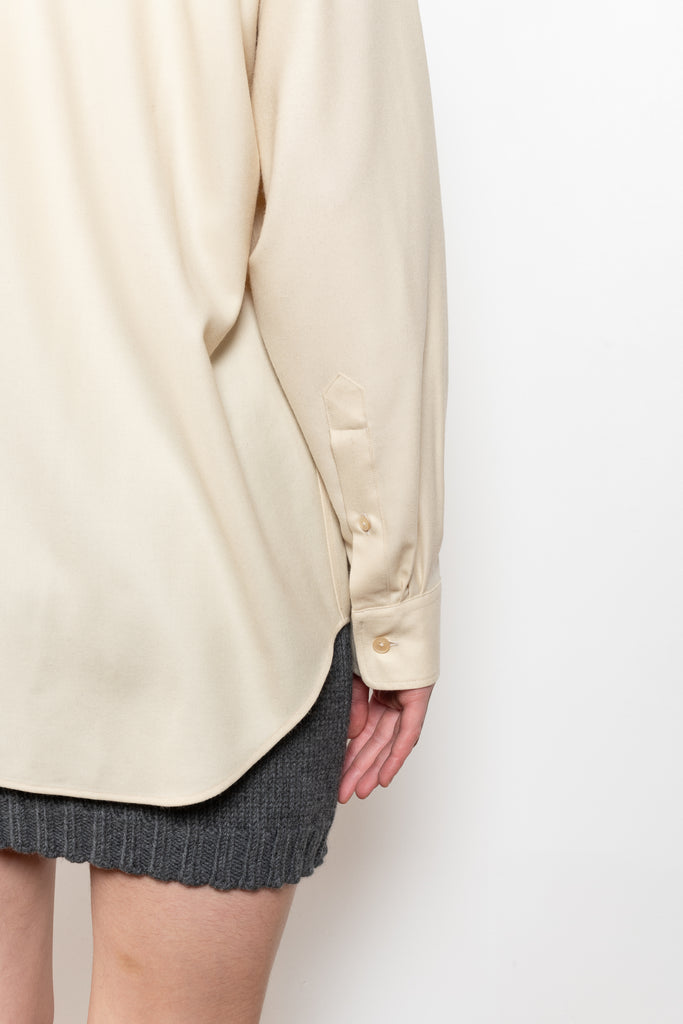 The Light Wool Shirt by Auralee is a loose button up shirt in a soft wool