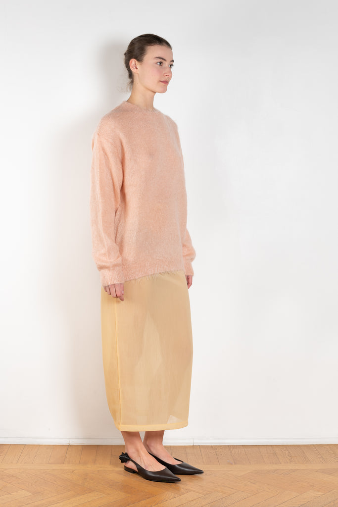 The Brushed Mohair Knit by Auralee is a knitted sweater woven from delicately spun Super Kid Mohair