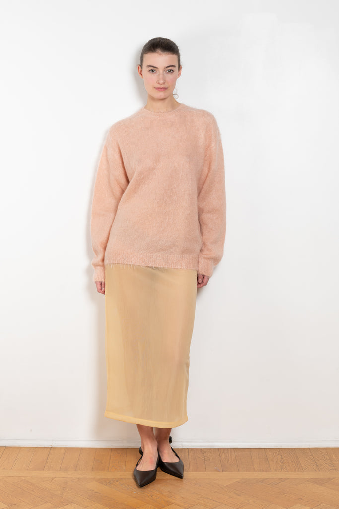 The Brushed Mohair Knit by Auralee is a knitted sweater woven from delicately spun Super Kid Mohair