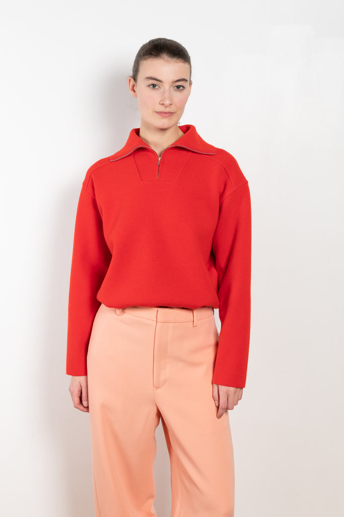 The Milano Rib Knit by Auralee is a relaxed sweater with a half zip closure in a Milano rib