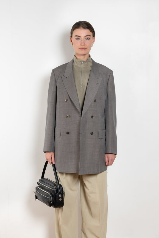 The Double Breasted Jacket by Auralee is a relaxed suit jacket made in a tropical wool kid mohair with a lightweight mid season feel perfect for everyday wear