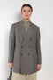 The Double Breasted Jacket by Auralee is a relaxed suit jacket made in a tropical wool kid mohair with a lightweight mid season feel perfect for everyday wear