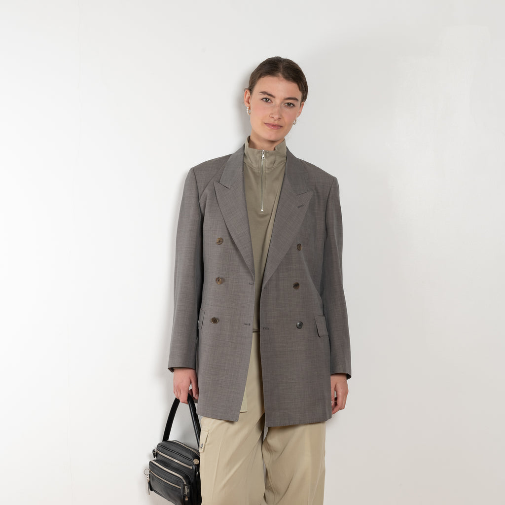 The Double Breasted Jacket by Auralee is a relaxed suit jacket made in a tropical wool kid mohair with a lightweight mid season feel perfect for everyday wear