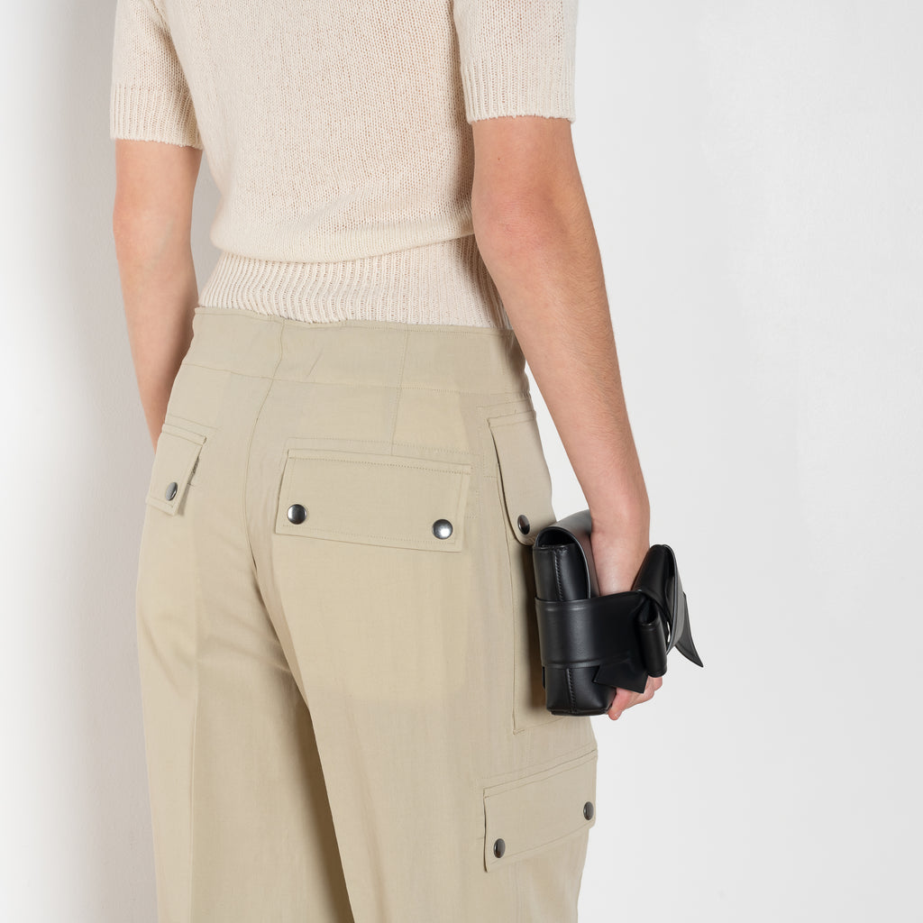 The Lightweight Cargo Pants by Auralee is a relaxed trouser in a lightweight cotton and wool blend with cargo details