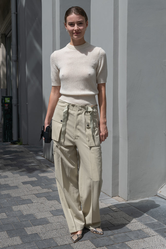 The Lightweight Cargo Pants by Auralee is a relaxed trouser in a lightweight cotton and wool blend with cargo details