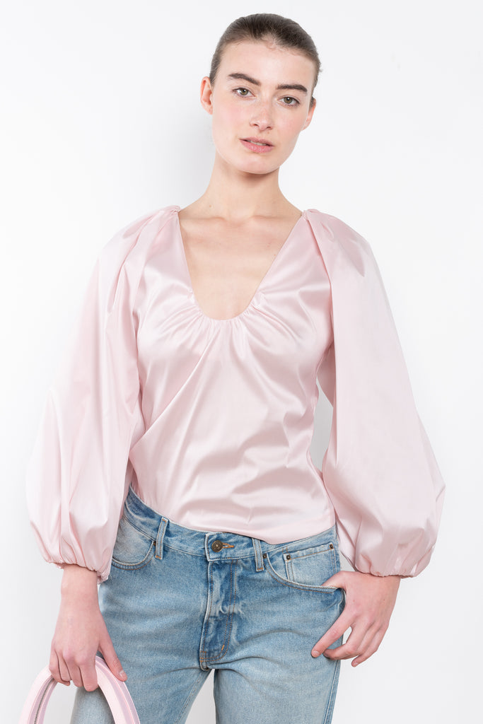 The Top Jos by Bernadette is a crisp taffeta summer top with long puffed sleeves, a deep V-neck and an elegant centered waistline