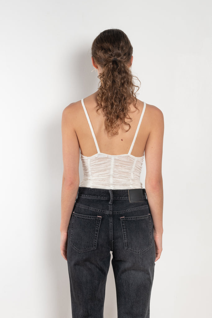 The Sirene Lace Body by Bite is crafted from fine floral lace jersey, featuring subtle ruching along the fitted bodice and BITE’s signature Sirene-shaped neckline.