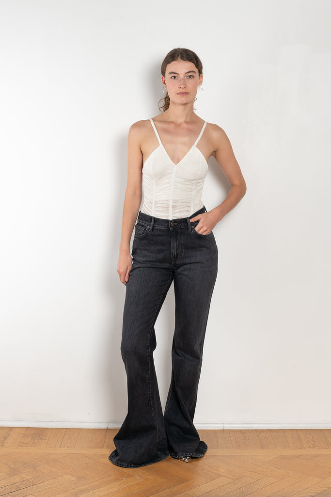 The Sirene Lace Body by Bite is crafted from fine floral lace jersey, featuring subtle ruching along the fitted bodice and BITE’s signature Sirene-shaped neckline.