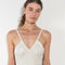 The Sirene Lace Body by Bite is crafted from fine floral lace jersey, featuring subtle ruching along the fitted bodice and BITE’s signature Sirene-shaped neckline.