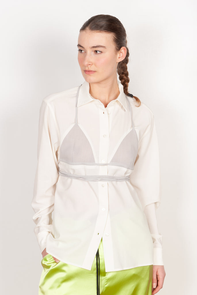 The Bikini Shirt by Botter is a cream shirt with a integrated bikini detail to tie in the back