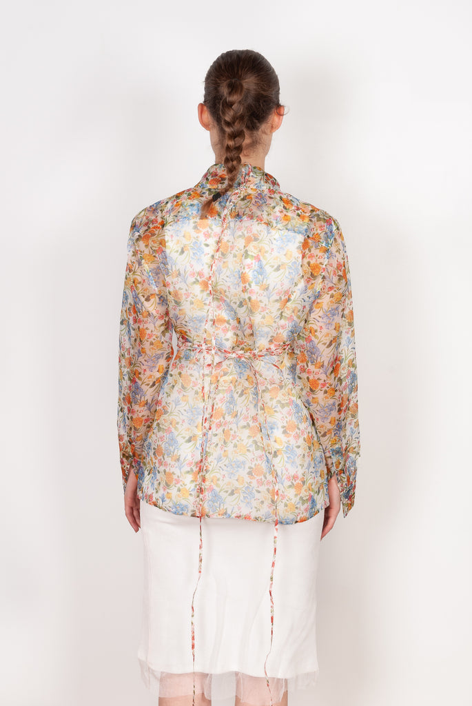 The Bikini Shirt by Botter is a floral silk shirt with a integrated bikini detail to tie in the back