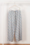 The Pyjama Trousers by Botter are relaxed silk trousers with a seasonal fish print