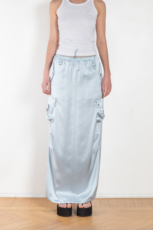 The Satin Cargo Skirt by Coperni is a signature maxi skirt with cargo details and an adjustable waistband to carry high or low slung according to your likings