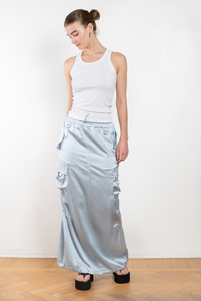 The Satin Cargo Skirt by Coperni is a signature maxi skirt with cargo details and an adjustable waistband to carry high or low slung according to your likings