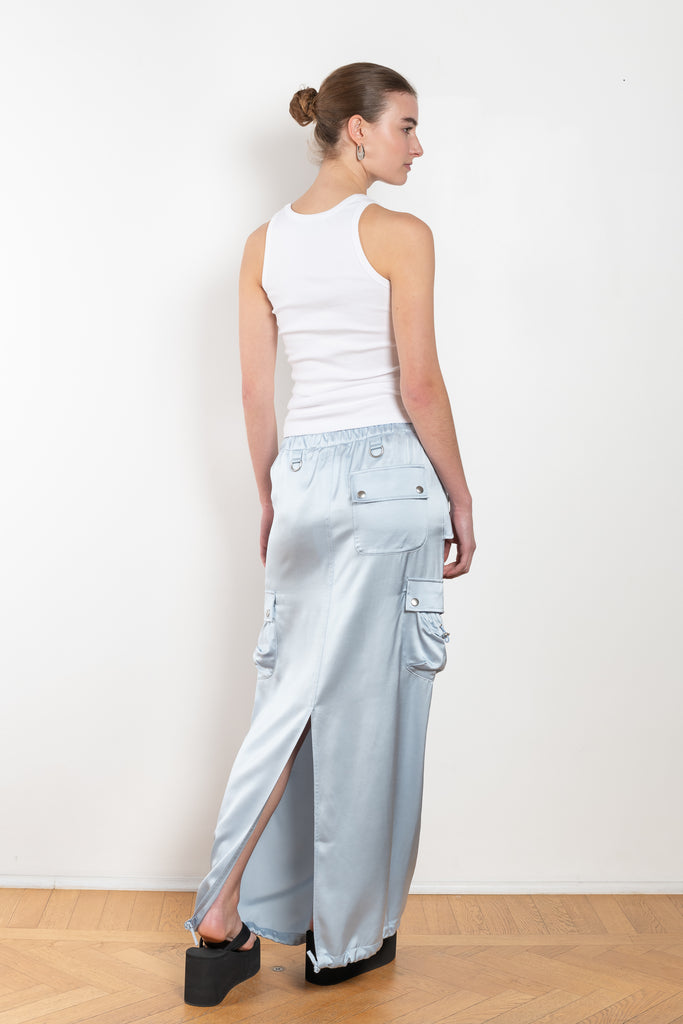 The Satin Cargo Skirt by Coperni is a signature maxi skirt with cargo details and an adjustable waistband to carry high or low slung according to your likings