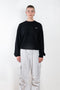 The Branded Crewneck Jumper by Coperni is a signature loose fitted sweater with a small logo on the chest