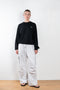 The Branded Crewneck Jumper by Coperni is a signature loose fitted sweater with a small logo on the chest