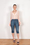 The Cropped Denim Pants by Coperni are high waisted knee length pants with a very fitted silhouette